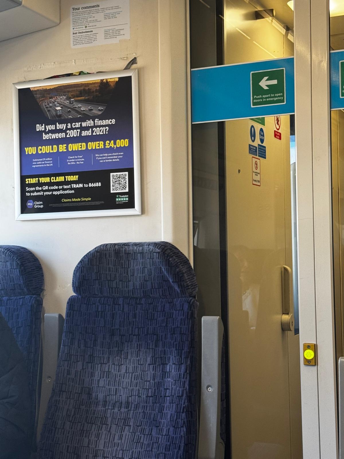 Rail carriage transit poster for My Claim Group